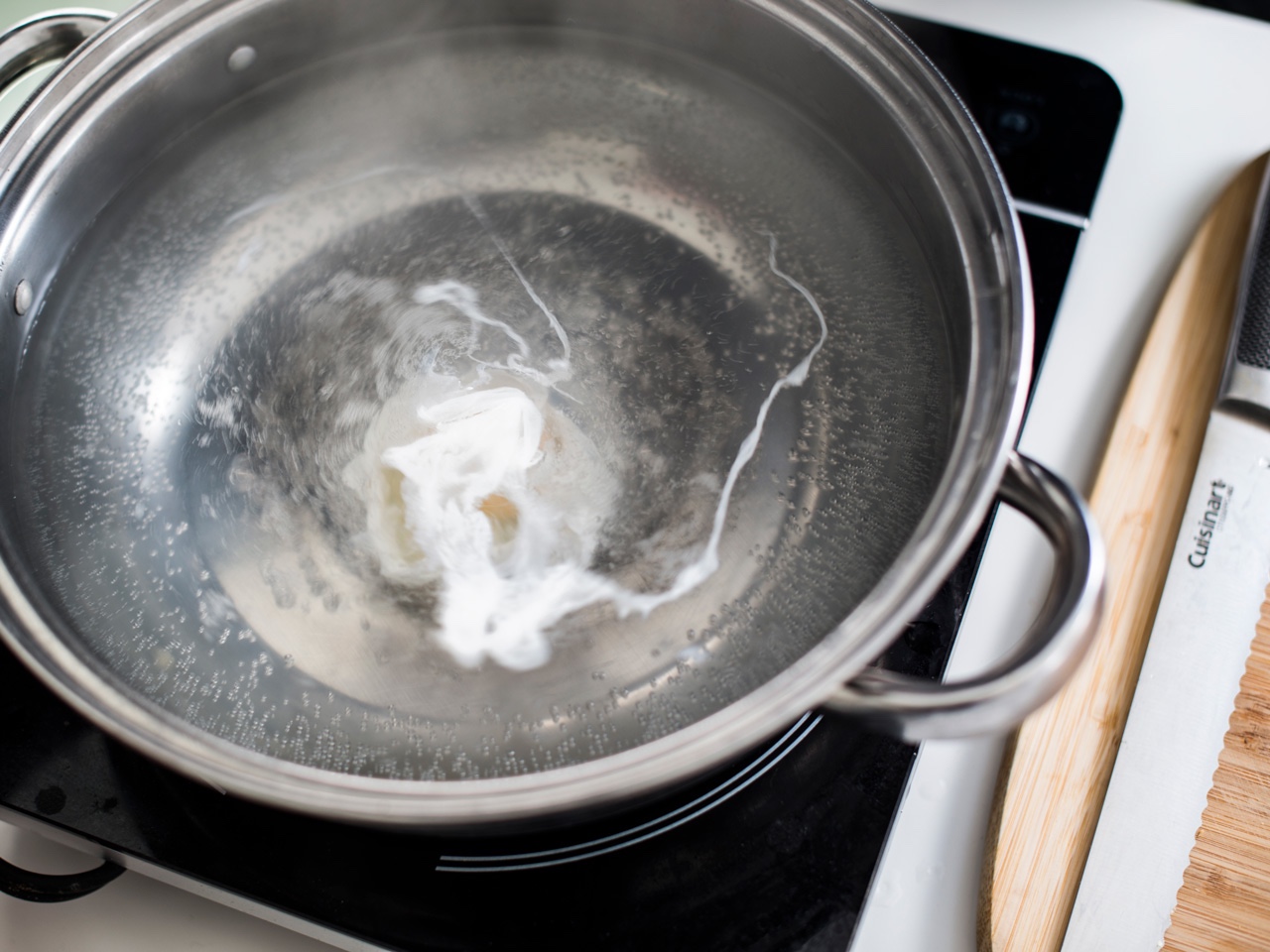 egg cooking in water