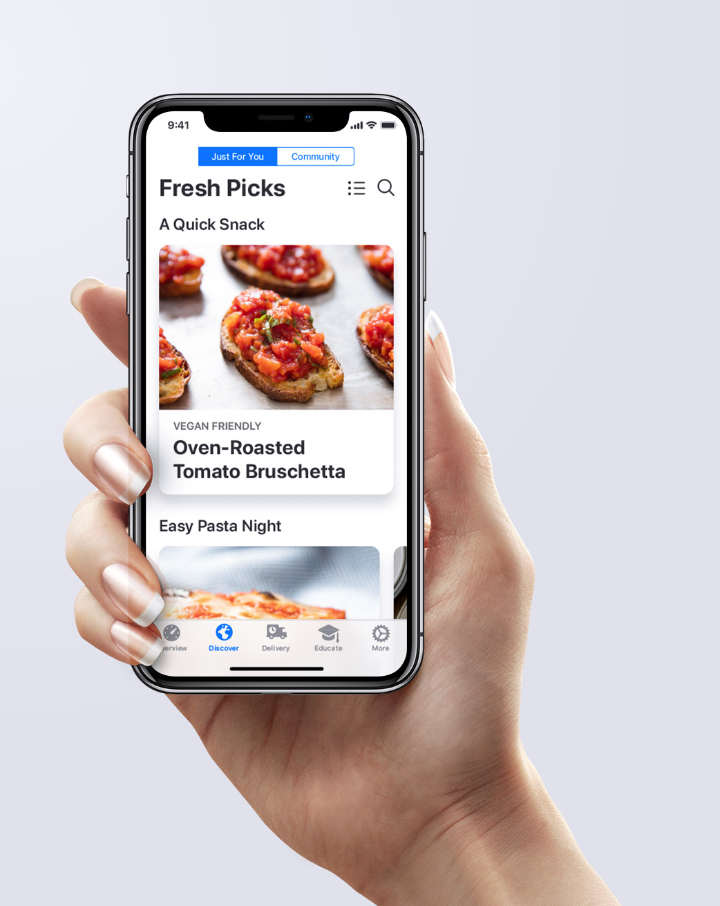 Hand holding an iPhone with the Echo Gourmet app displayed on the screen.